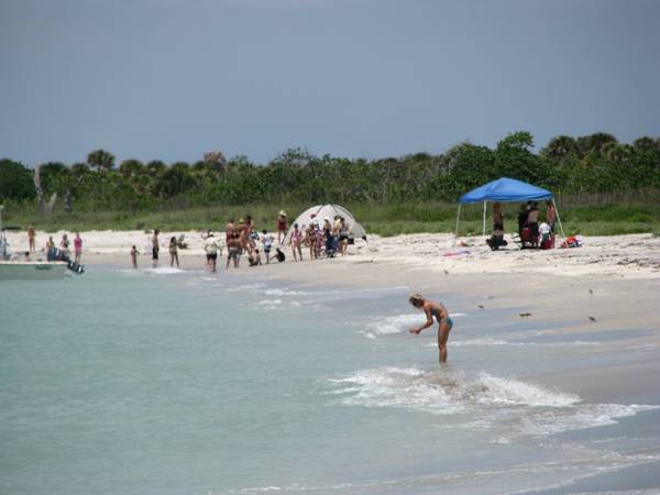 Day visitors and campers enjoying Cayo Costa beach.