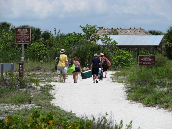 Cayo Costa day visitors walking back to the tram station.