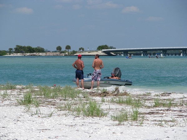 Weekend boaters on the southern tip of Little Gasparilla Island, Florida.