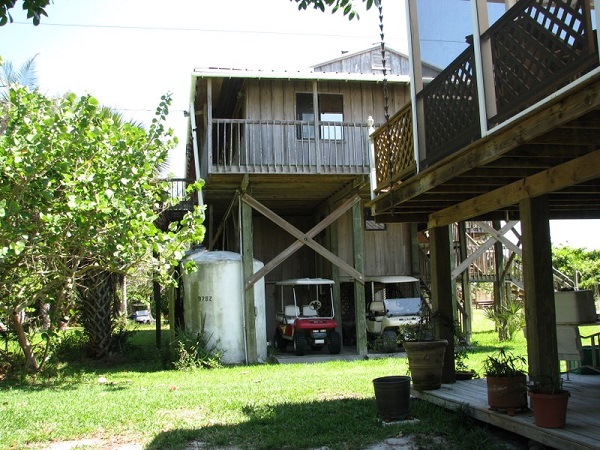 House with cistern for water collection on Little Gasparilla Island, Florida.
