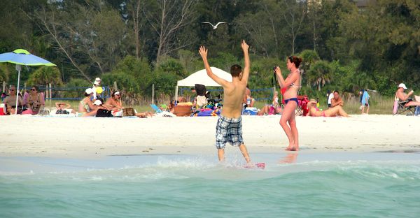 Having fun on Siesta Key Public Beach, Sarasota, Florida.