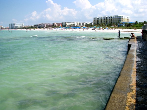 Clear water and seawall at Point-of-Rocks, Siesta Key, Florida.
